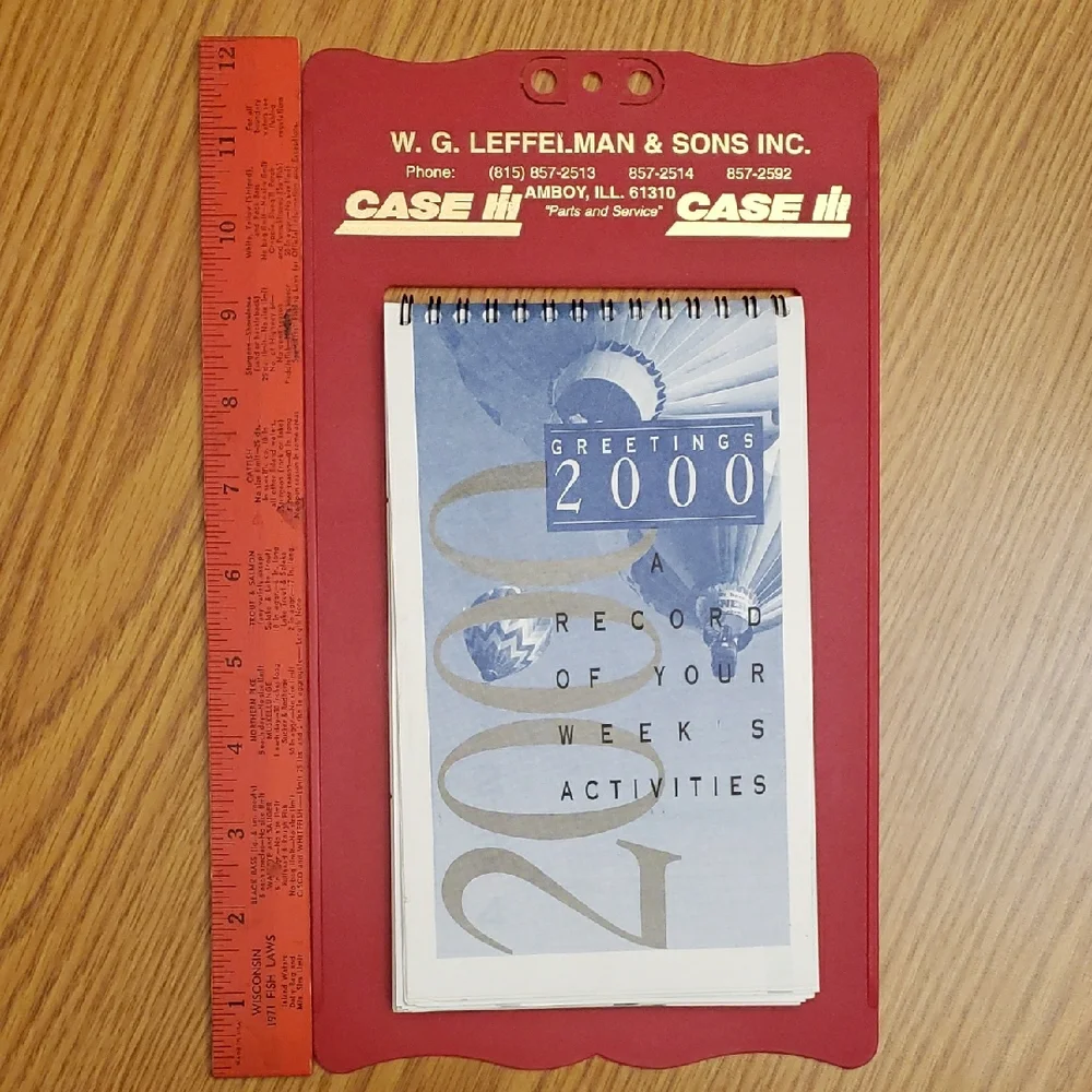 Weekly Activity Calendar with Red Clipboard